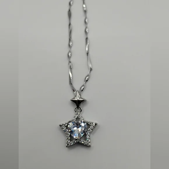 Elegant Silver Star Pendant Necklace - Picture 6 of 7